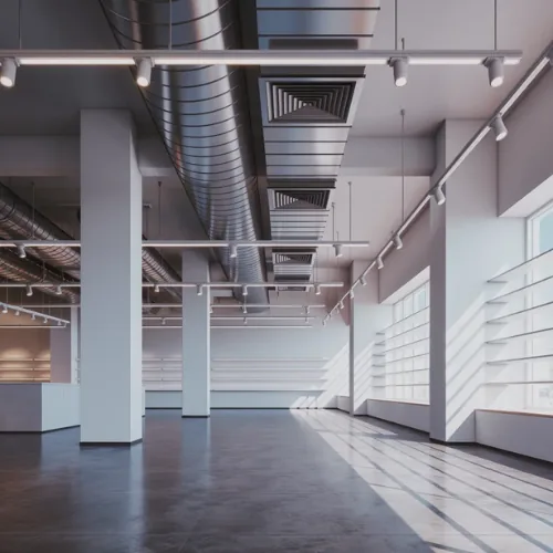 Photorealistic commercial interior render showing exposed HVAC ductwork and ceiling diffusers, track lighting, polished concrete floor, and large windows.