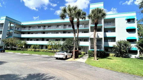 Multistory condominium with exterior balconies and walkways