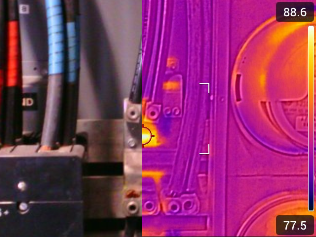 Infrared thermography on a 400 A service entrance and meter reveals localized hot-lug connections—required imaging for Florida building recertification compliance.