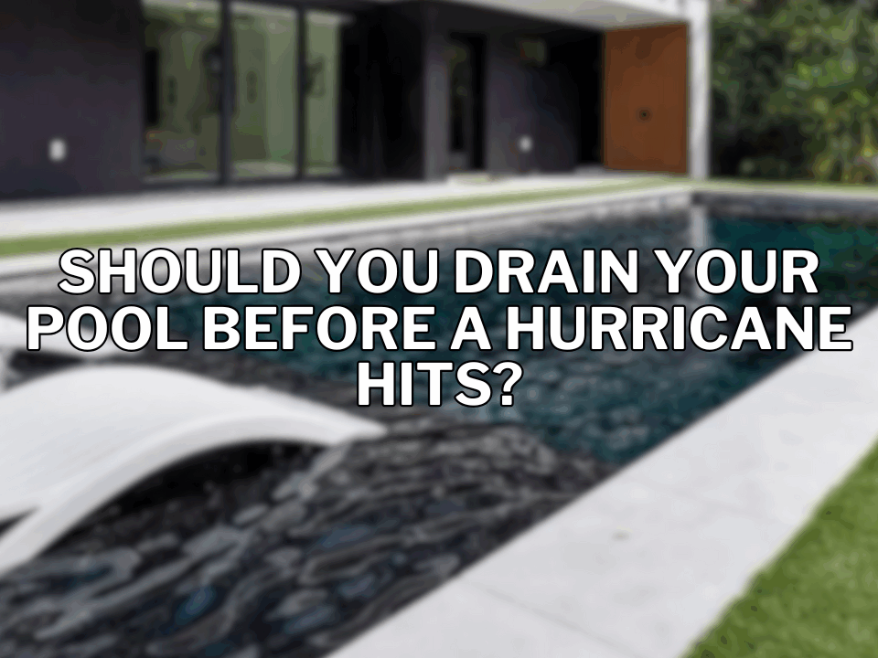 Modern backyard swimming pool with white in-water lounge chairs, blurred background of a contemporary home, and bold text overlay reading “Should you drain your pool before a hurricane hits?” in the center. Florida Engineering (FE) logo in the bottom right corner.