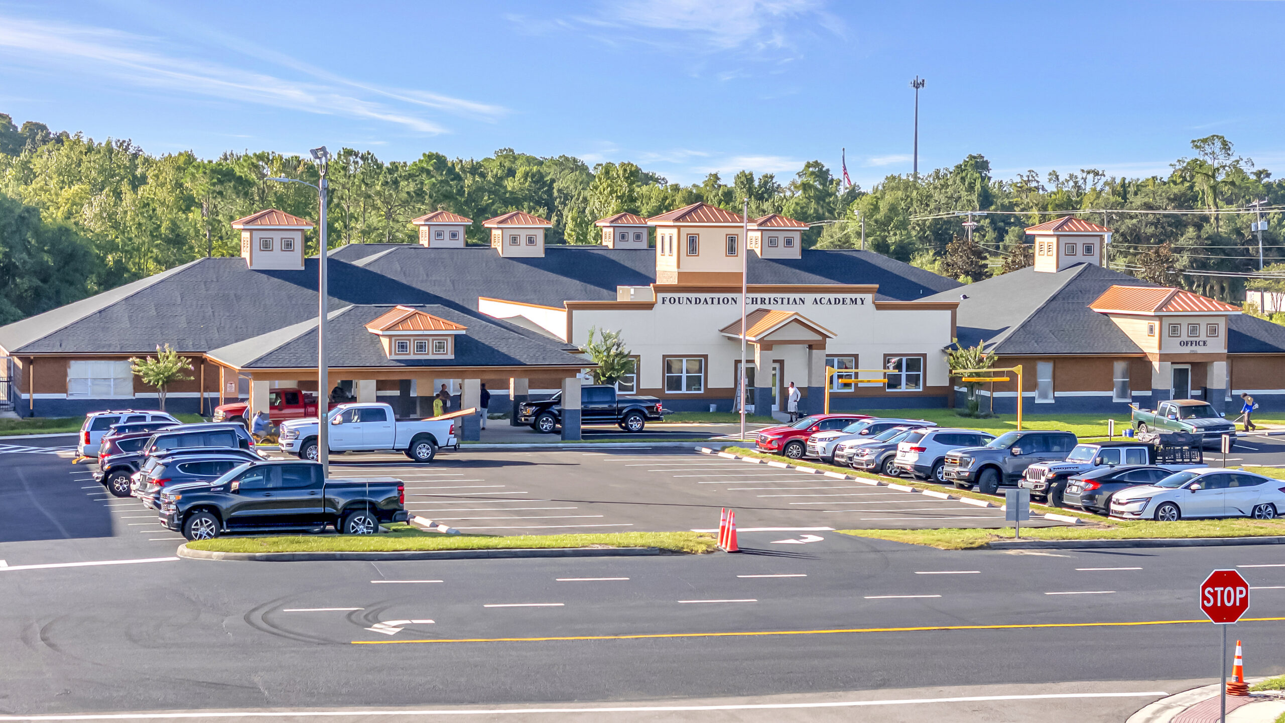 MEP and Structural for the addition of new classrooms, the white building